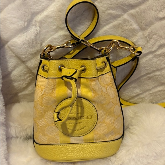 Coach Handbags - Coach Yellow Bucket Bag